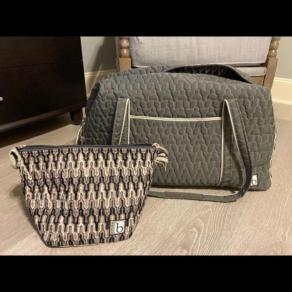 Cinda B weekender bag with matching toiletry case.